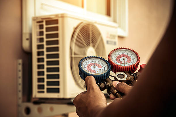 Professional Air Conditioning Service technician working in Dale, PA